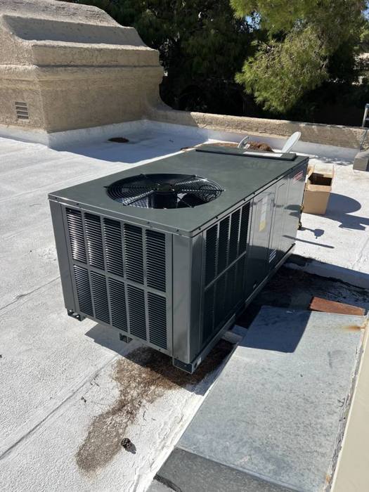 AC package unit installed on a tile rooftop in Las Vegas